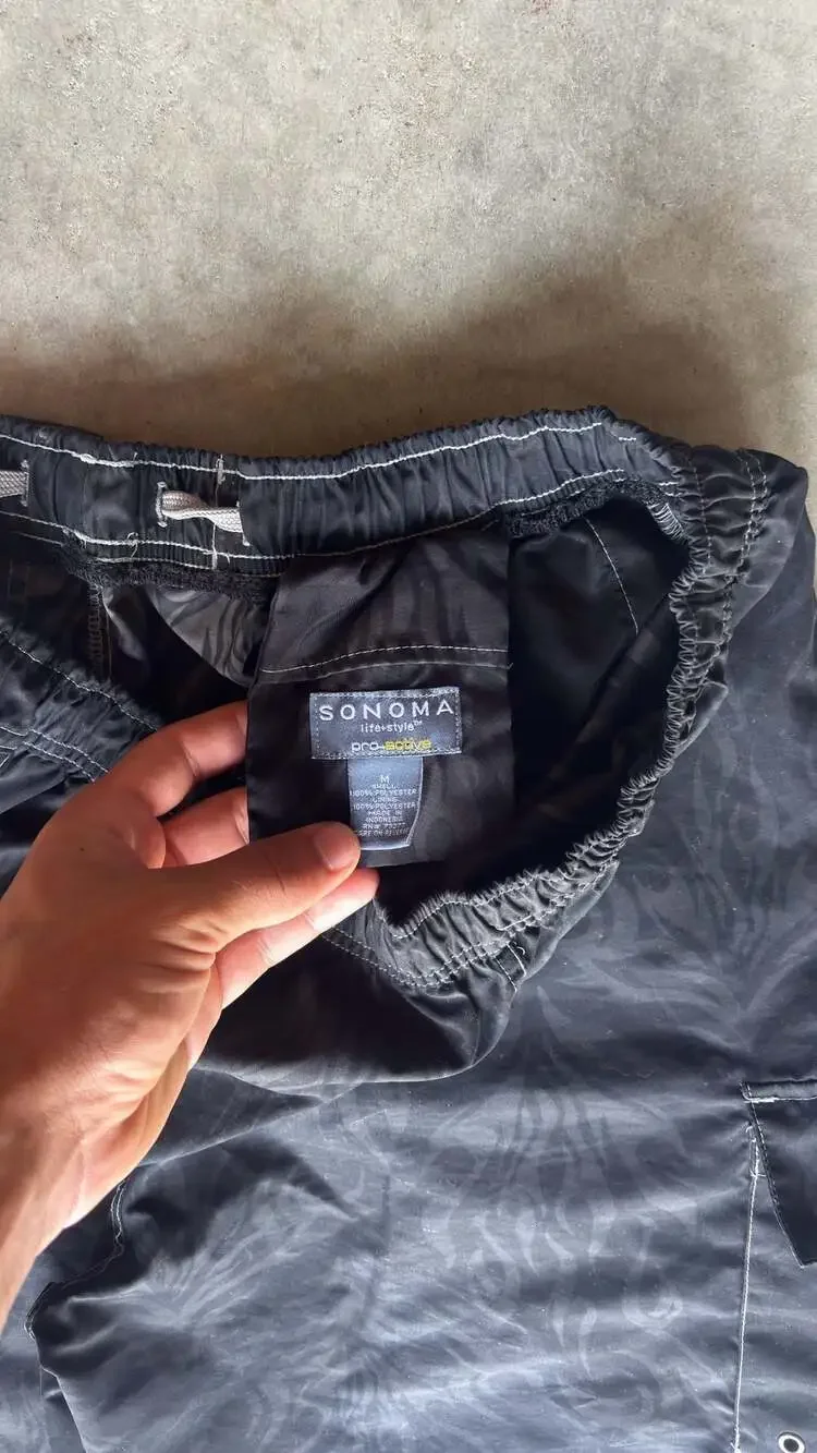 Vintage 00s tribal flames baggy board shorts